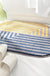 Elliptical Stripe Bath Mat