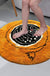 Feblilac Round Orange Background Black and White Flowers Tufted Bath Mat by Liz Gamberg Studio from US