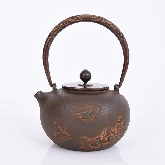 Cast Iron Embroidered Teapot Boiling Water