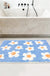 White Flower with Blue Ground Bath Mat